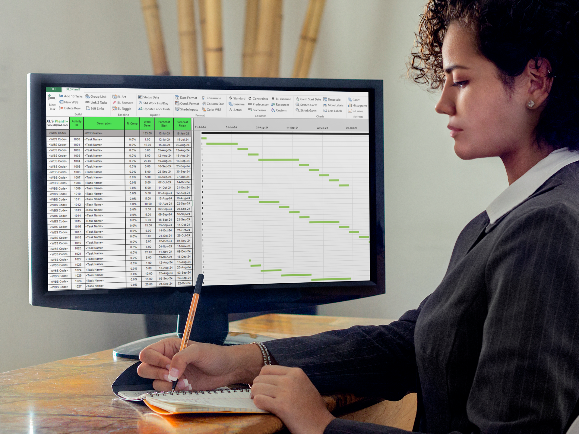 https://xlsplanit.com/wp-content/uploads/2024/07/businesswoman-on-pc-desktop-mockup-template-1.png